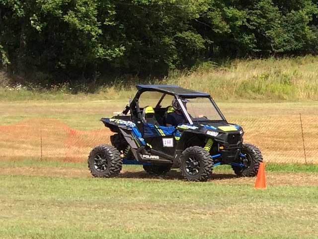blue and black RZR side by side